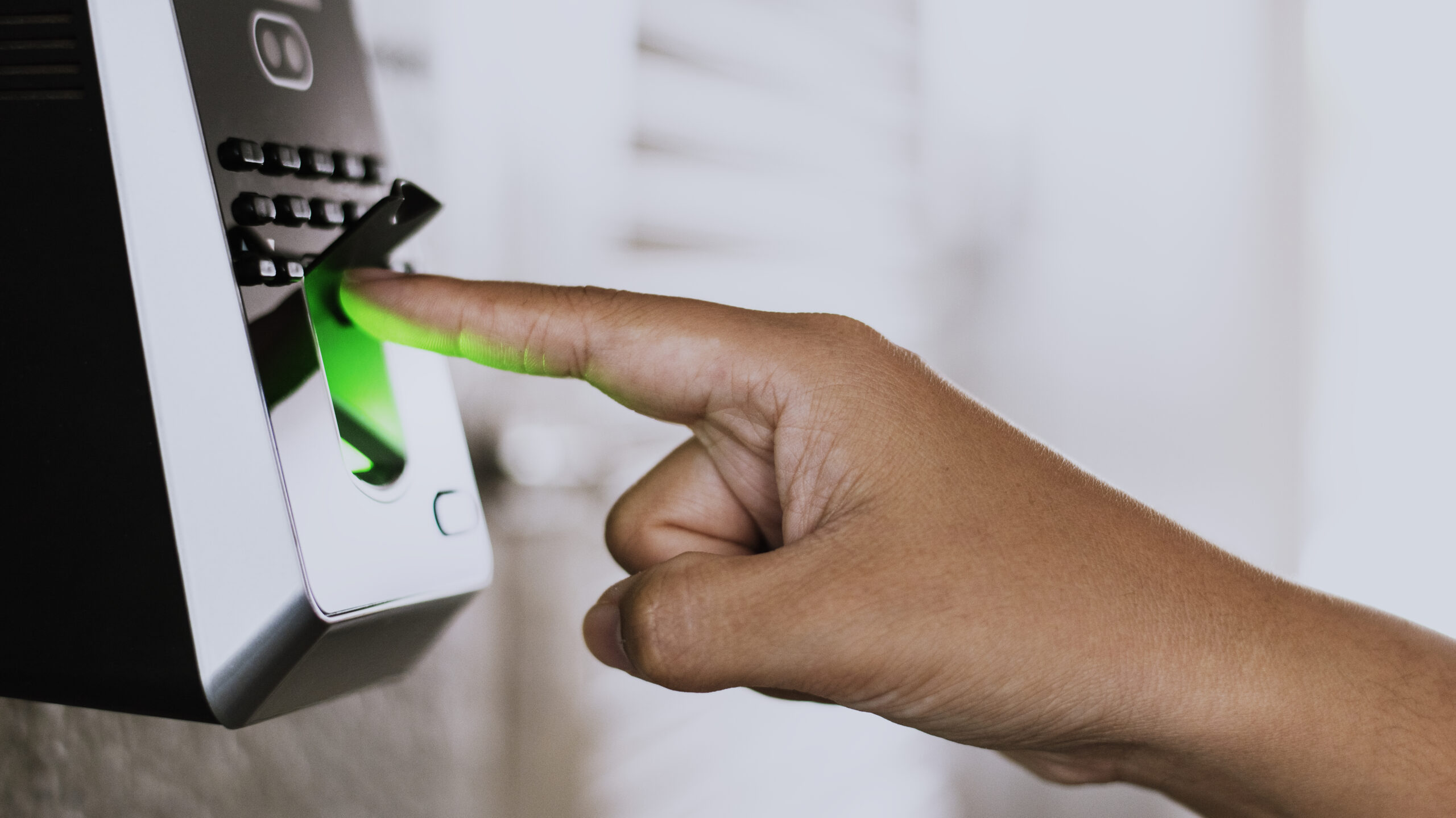 scanning finger on a coronavirus contaminated fingerprint access control